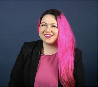 Screenshot of Katie Moussouris in a photography studio.