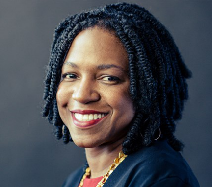 Portrait of Stacy Brown-Philpot smiling at the camera.