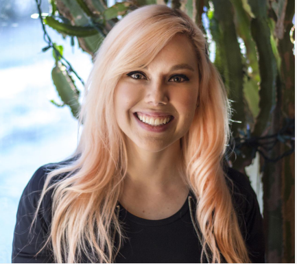 Screenshot of Stephanie Harvey standing in front of a cactus.