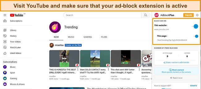 YouTube Trending page with Adblock Plus actively blocking ads.